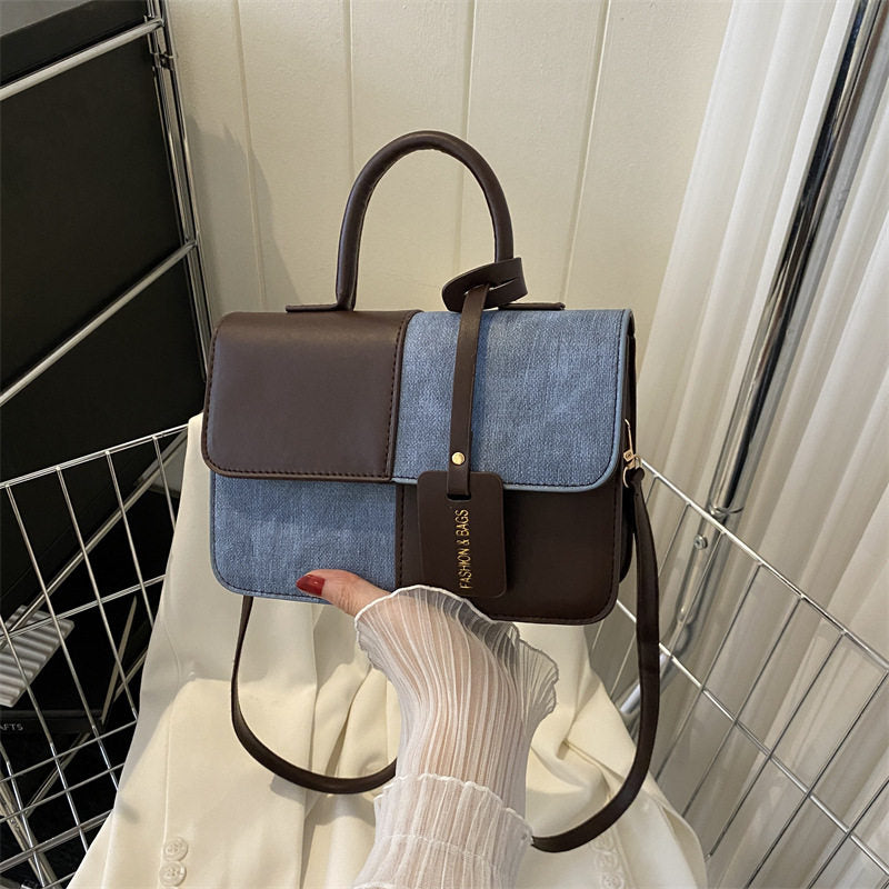 Fashionable patchwork handbag